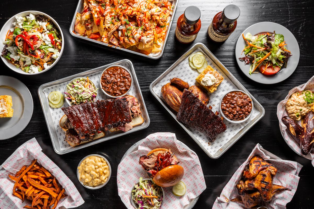 a bunch of different types of food on a table